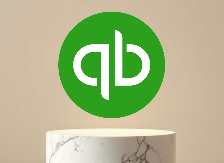 QuickBooks Logo Symbol hovering above a marble pedestal against a light beige background