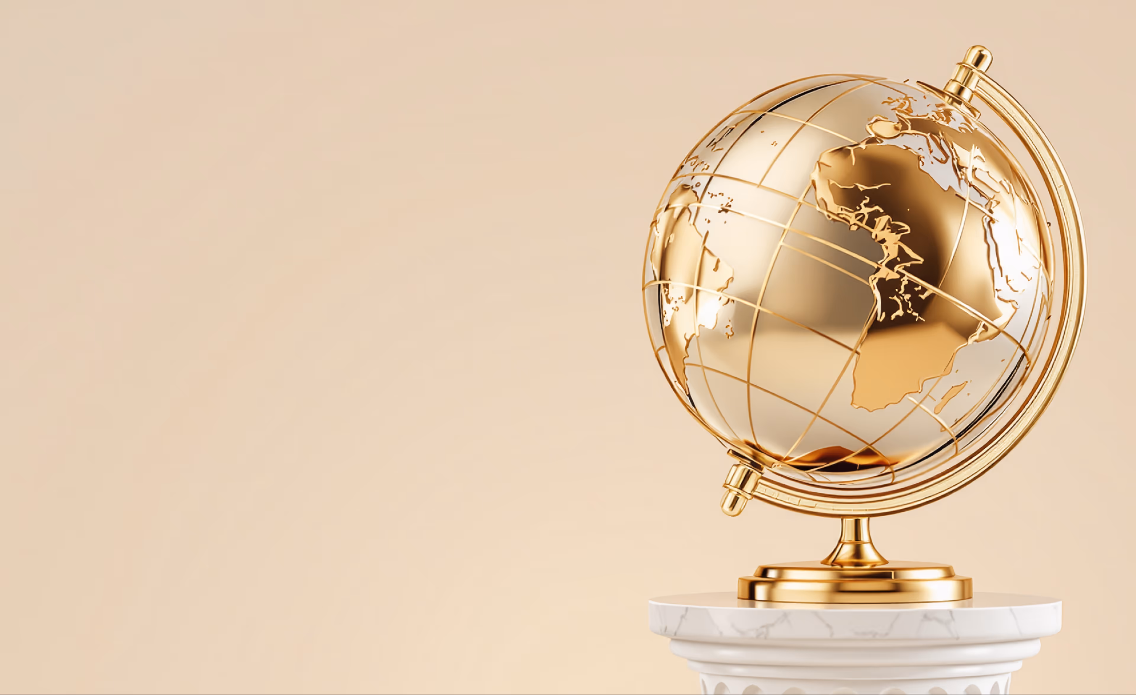 Polished golden globe displaying Africa and Europe, mounted on a marble pedestal against a warm beige background, symbolizing global reach and scalability.