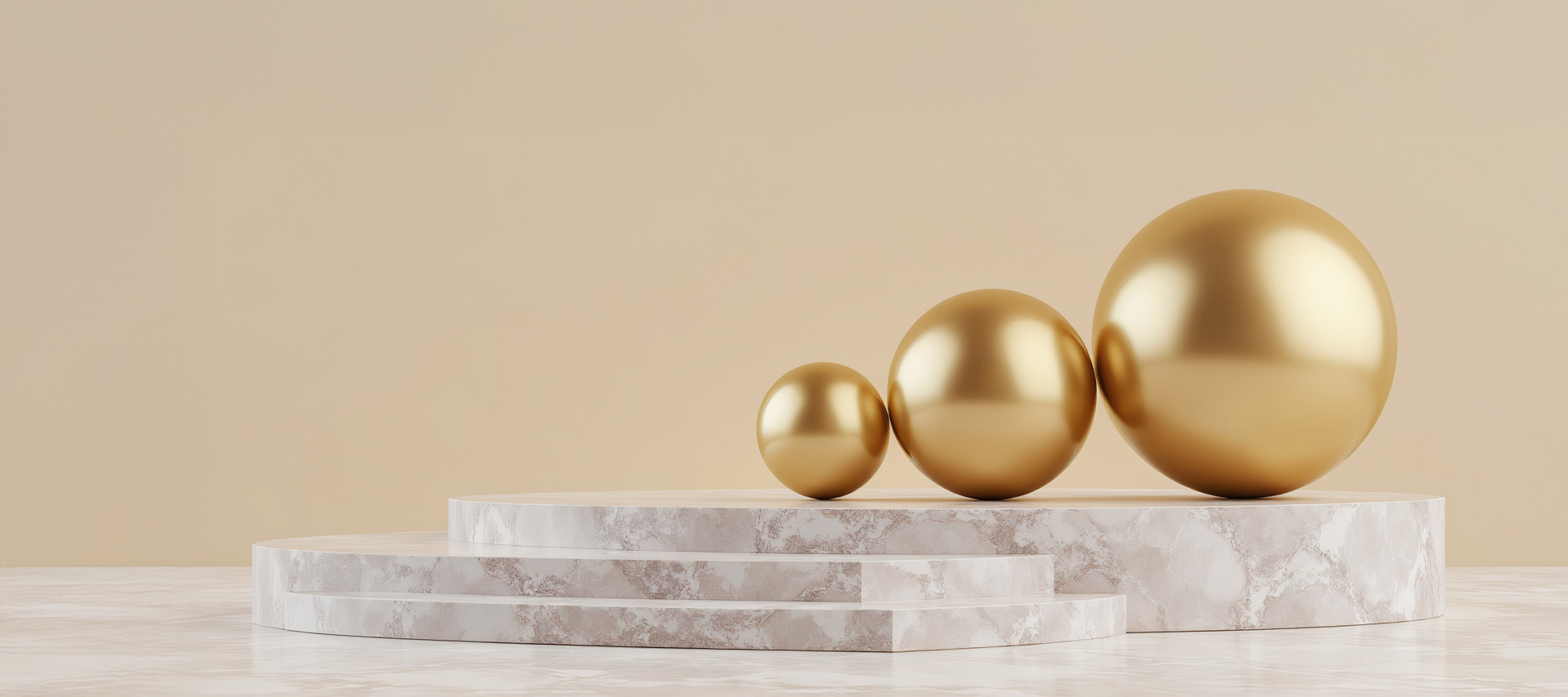 Three golden spheres of varying sizes on a marble podium