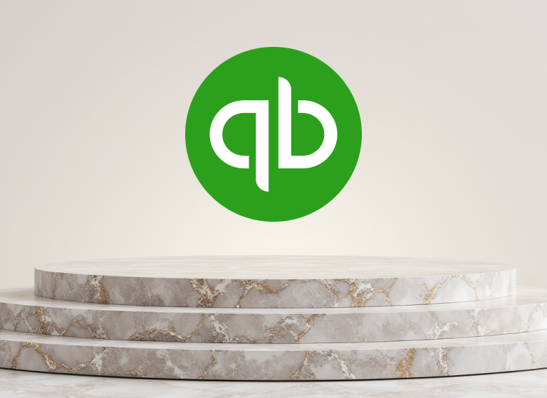 QuickBooks Logo Symbol hovering above a three-tiered marble pedestal against a light beige background